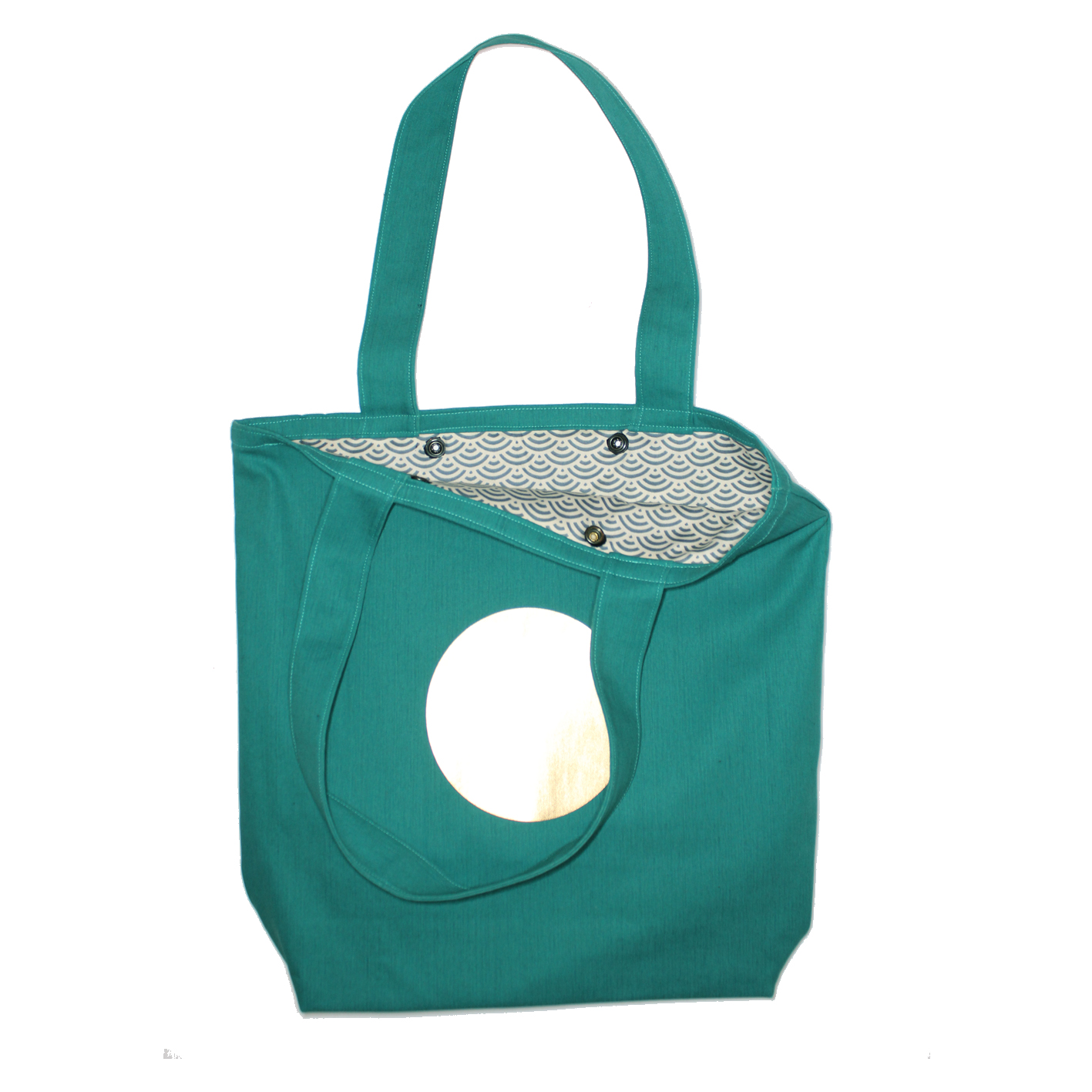 Big green denim shopper with golden sun and cotton lining.