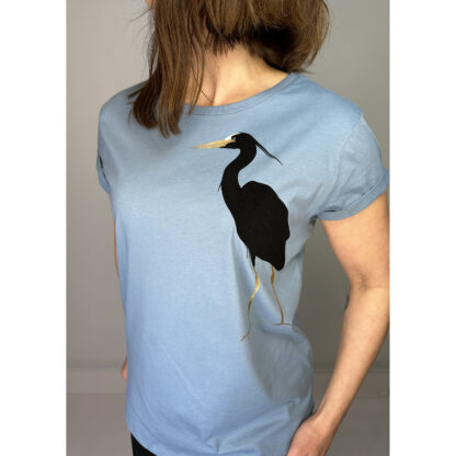 Organic Cotton Shirt by Girl and the Heron: Crafted from soft 100% organic cotton jersey, featuring a stylish medium fit, curved hem, and rolled-up sleeves. Designed and produced in Studio Catta Amsterdam with a sophisticated blend of black flock foil and matt gold and white. Free NL shipping & €12 worldwide shipping
