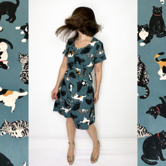 Enchanting Teal Green Dress with Japanese Cats Print: Crafted from 100% premium Japanese cotton, featuring a flattering elastic waist, classic neckline, and versatile roll-up sleeves. Meticulously designed and handmade in Studio Catta, Amsterdam, for impeccable quality. FREE shipping within the Netherlands and affordable worldwide rates!