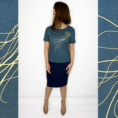 Teal shirt with golden medusa jellyfish print on soft organic cotton jersey fabric
