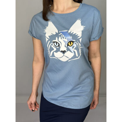 Dusk blue organic cotton Fair Wear shirt featuring a print of Bowie the Cat, with rolled-up sleeves and a rounded hemline, designed by Studio Catta with white, gold, and metallic blue accents.