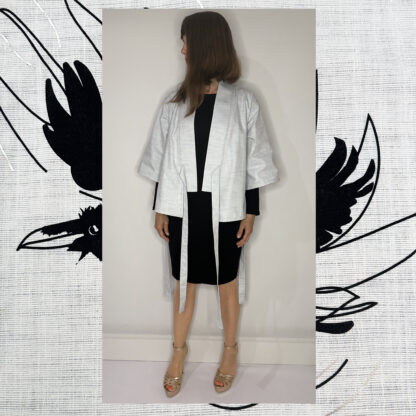 Happi coat with black velvet raven print on the back, handcrafted in Amsterdam by sustainable fashion designer Catta.