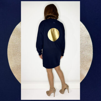 Dark blue oversized organic cotton sweater with golden sun print, sustainable fashion piece from Studio Catta