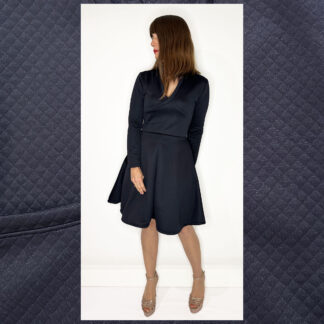 Elegant long-sleeve wrap dress with deep V-neckline and A-line skirt by Studio Catta Slowfashion Amsterdam.