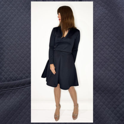 Elegant long-sleeve wrap dress with deep V-neckline and A-line skirt by Studio Catta Slowfashion Amsterdam.