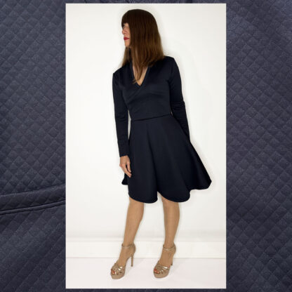 Elegant long-sleeve wrap dress with deep V-neckline and A-line skirt by Studio Catta Slowfashion Amsterdam.