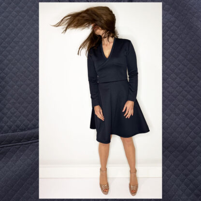 Elegant long-sleeve wrap dress with deep V-neckline and A-line skirt by Studio Catta Slowfashion Amsterdam.