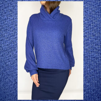 Handmade blue knit sweater with puffed sleeves and crossover turtleneck by Studio Catta